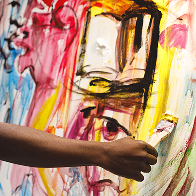 Abstrack artwork, artist adding the final brushstrokes to artwork on canvas